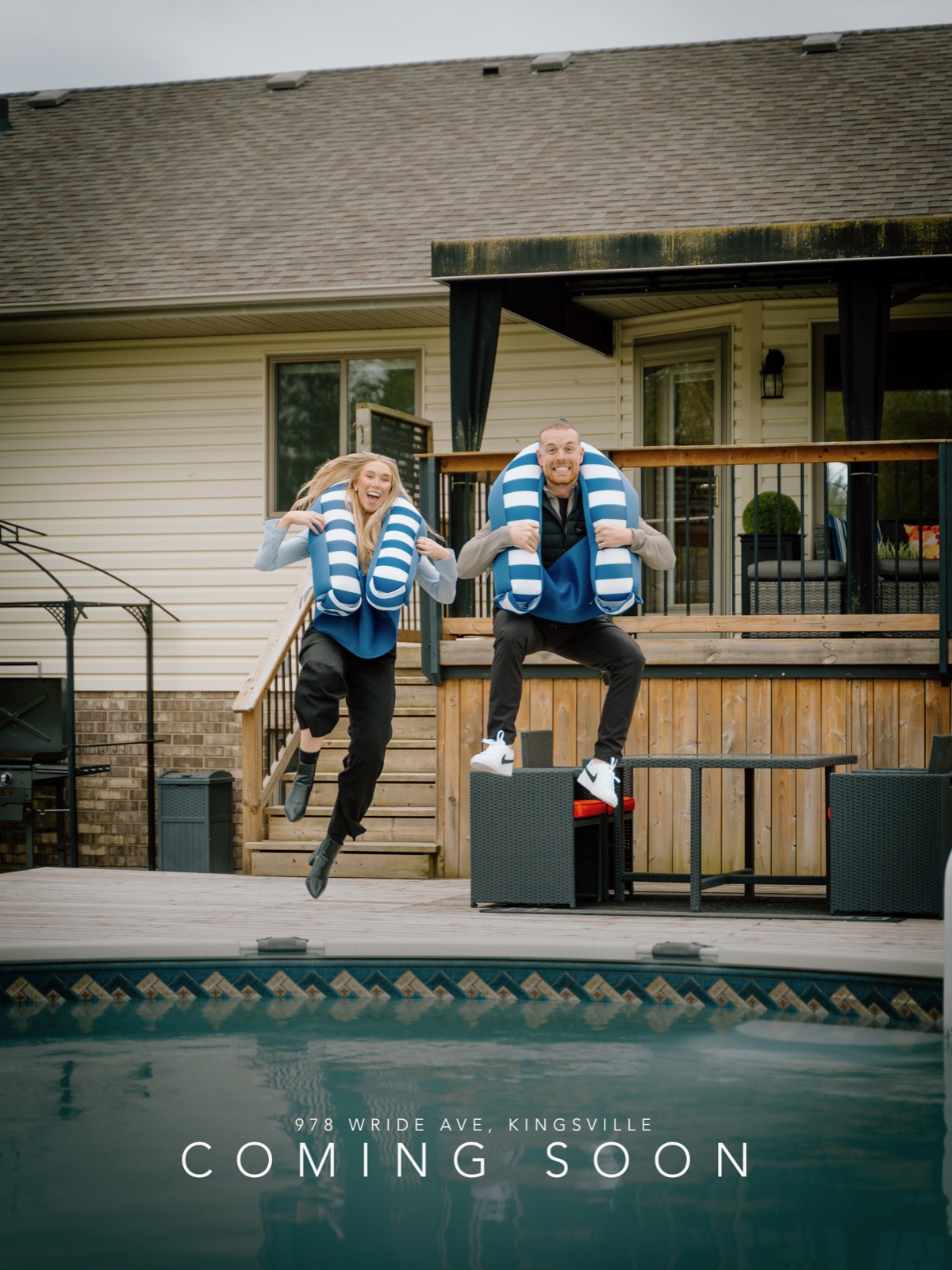 Coming Soon campaign image: Tyler and Jayci jumping beside a backyard pool at 978 Wride Ave, Kingsville